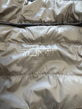 Tumi Quilted Puffer Vest - Metallic Gray. Packable into a pillow.